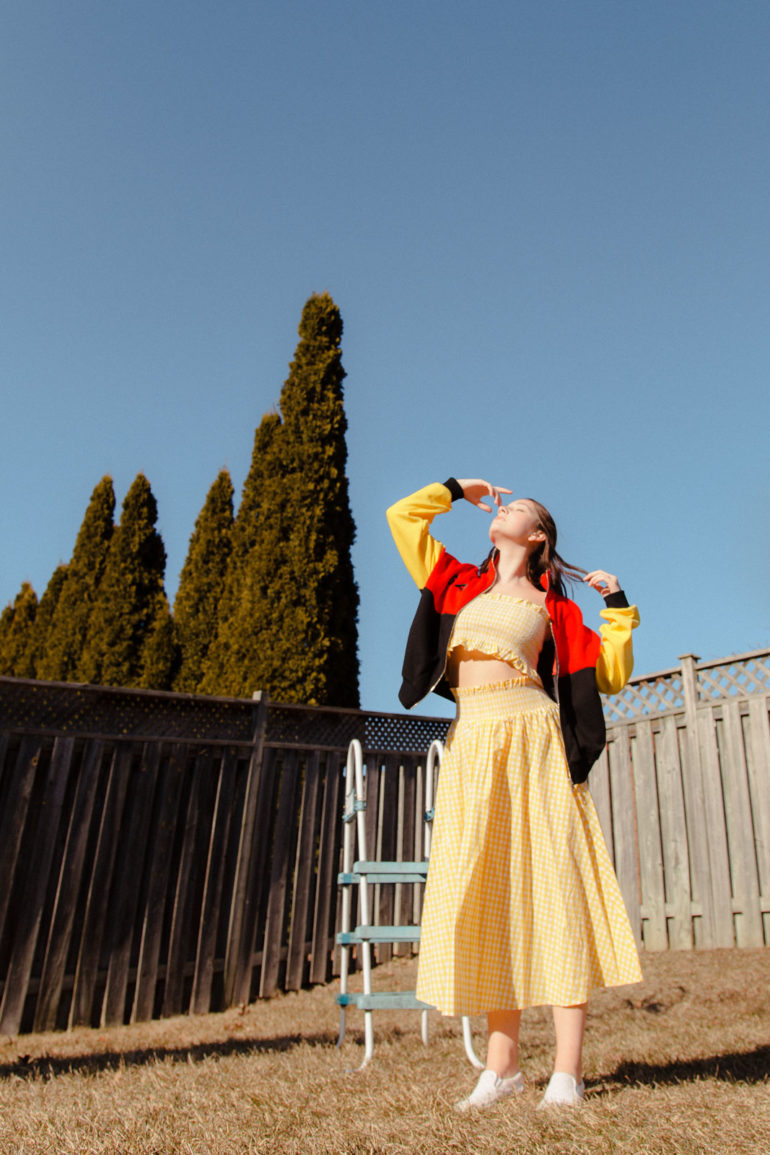 Emily Gilmore—Girl in yellow dress in backyard