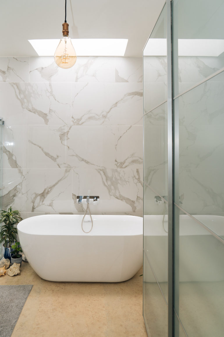 marble bathroom with tub
