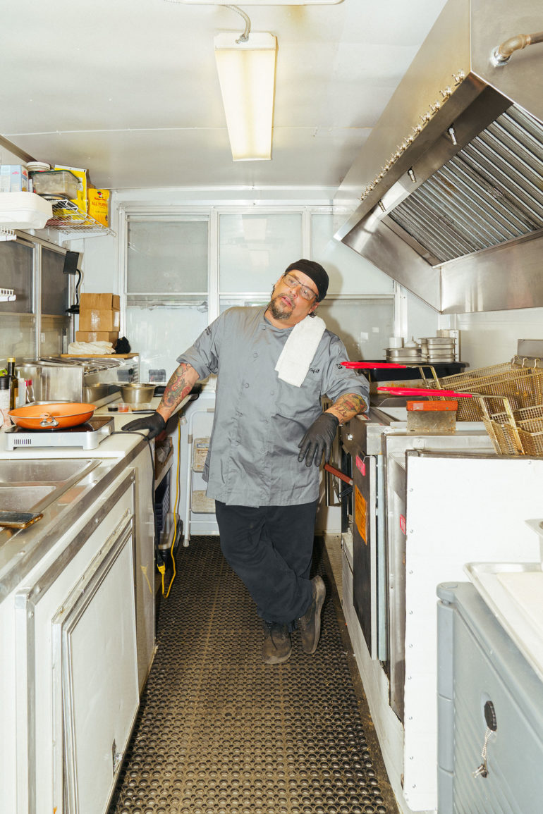 Danny Raposo standing in food truck