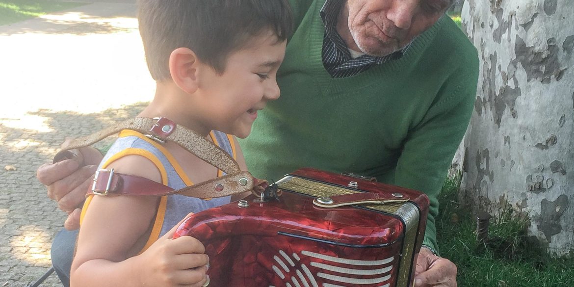 boy and grandfather concertina in Portugal